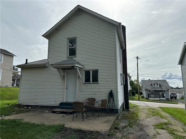 rear view of house featuring a patio area