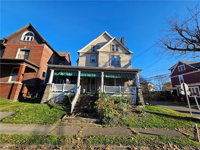 view of front of house with covered porch