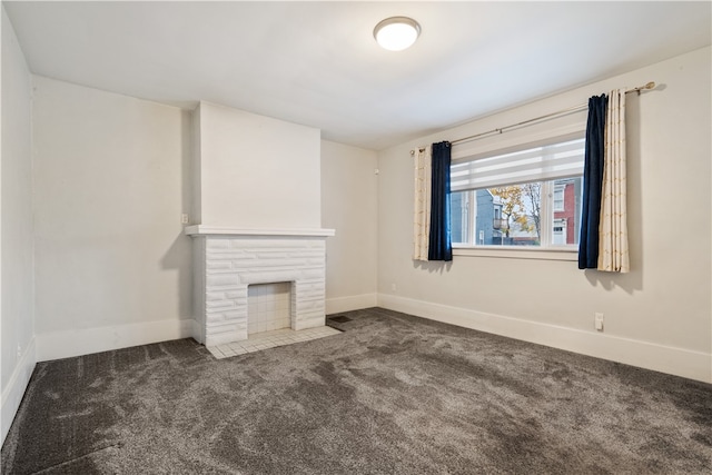 unfurnished living room featuring carpet flooring