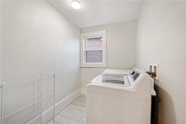 laundry room featuring washer and dryer