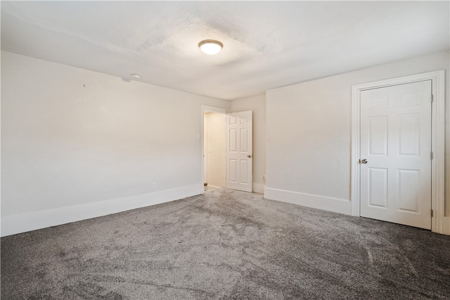 spare room with carpet floors