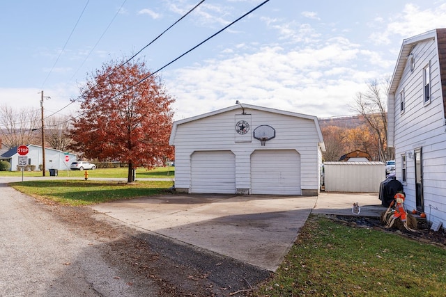 garage with a lawn