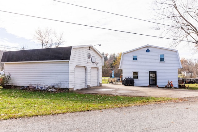 garage with a lawn