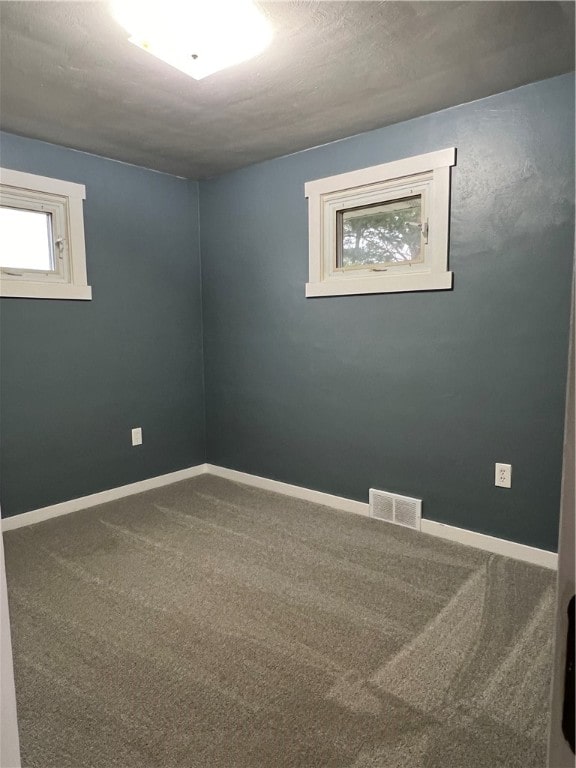 empty room with carpet floors