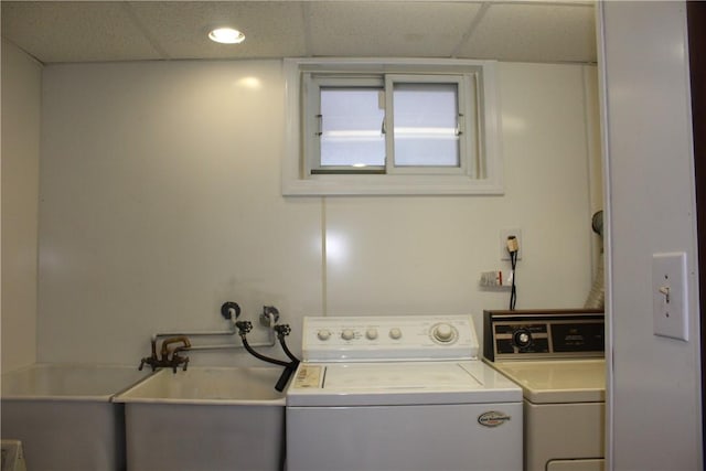 laundry room with separate washer and dryer