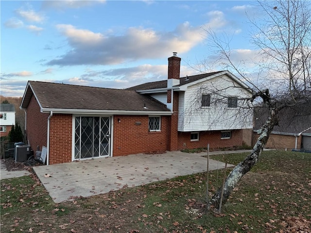 back of property with a patio area