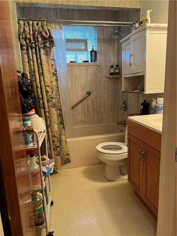 full bathroom featuring vanity, shower / bath combination with curtain, and toilet