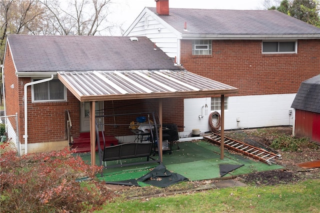 rear view of house featuring a patio