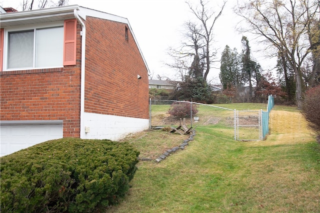 view of side of property with a yard