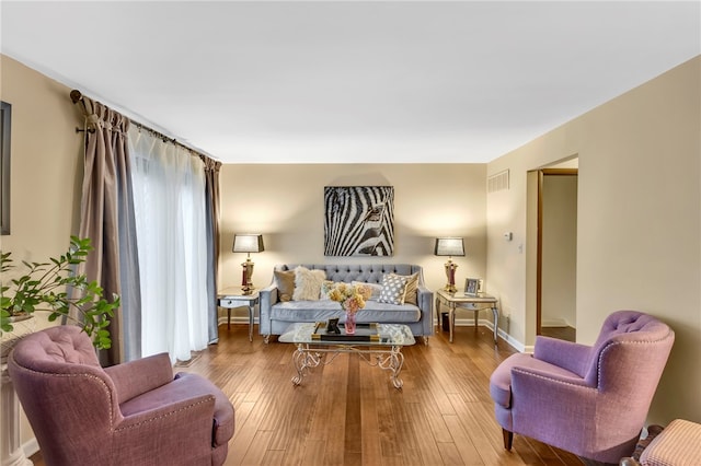 living room with hardwood / wood-style floors