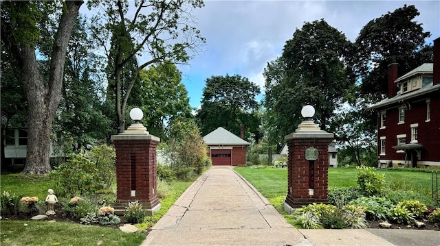 view of property's community with a yard