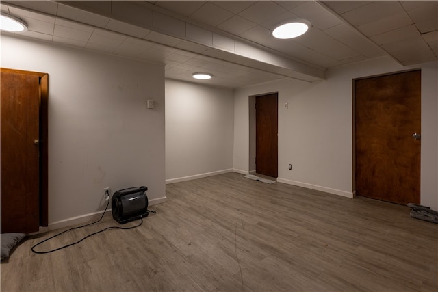 unfurnished room featuring hardwood / wood-style flooring