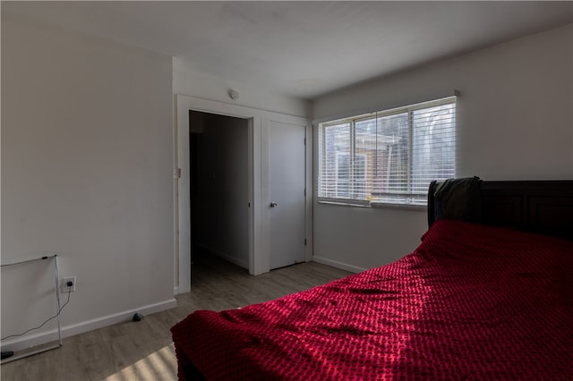 bedroom featuring light wood-type flooring