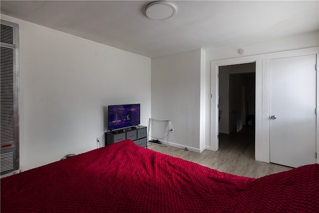 bedroom featuring light wood-type flooring