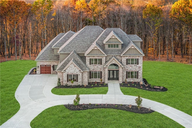 craftsman-style home featuring a front yard