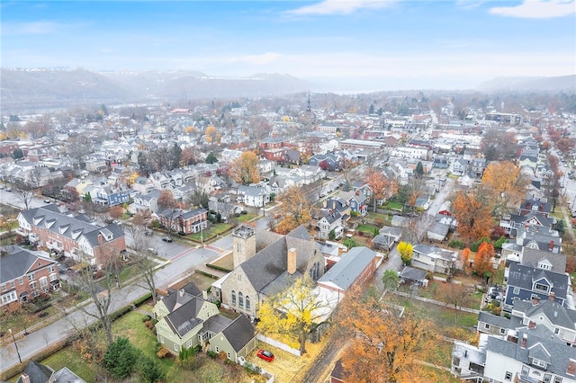 drone / aerial view featuring a mountain view