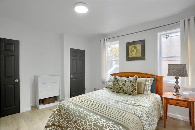 bedroom featuring light hardwood / wood-style flooring