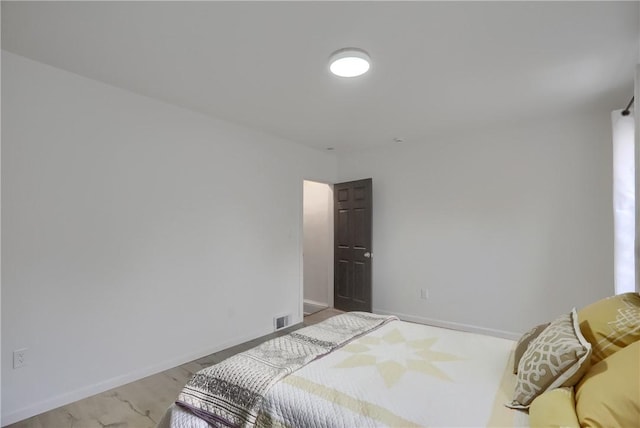 bedroom featuring light hardwood / wood-style flooring