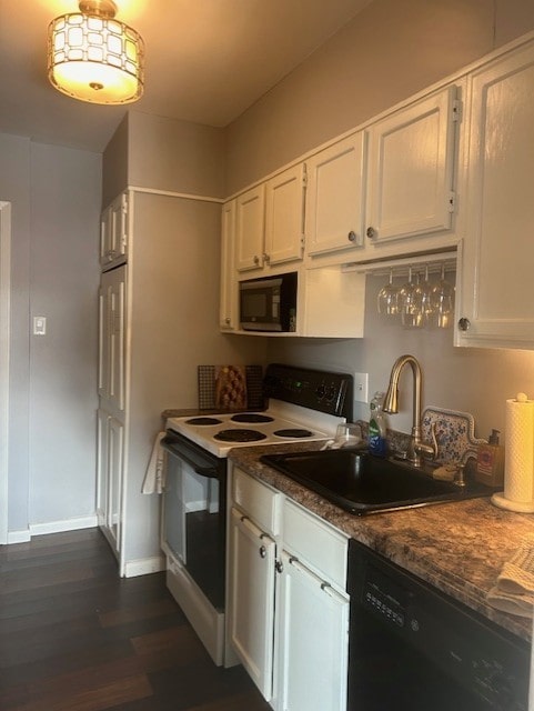 kitchen featuring white cabinets, black dishwasher, white range with electric cooktop, and sink