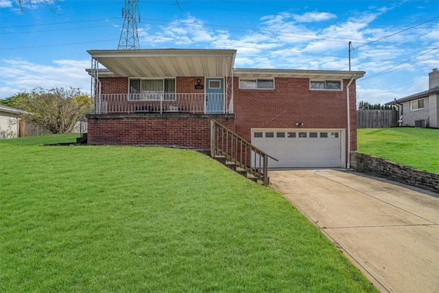 view of front of home with covered porch, a garage, a front lawn, and cooling unit