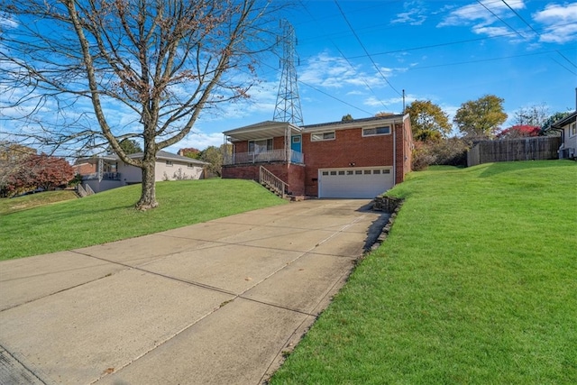 view of front facade featuring a front lawn and a garage