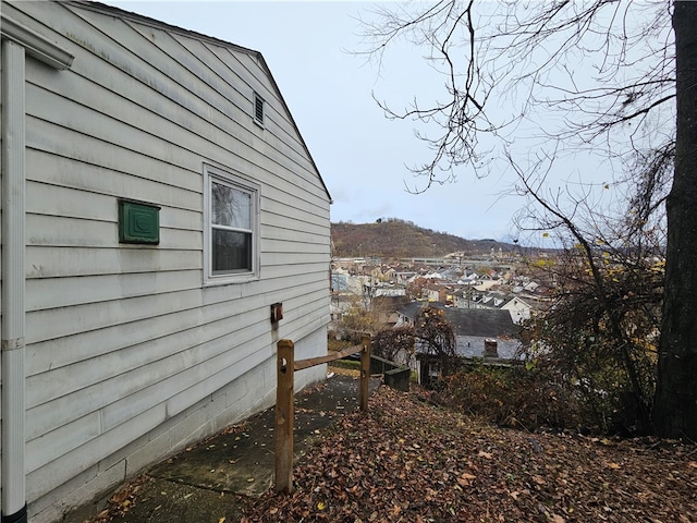 view of home's exterior with a mountain view