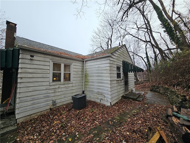 view of home's exterior featuring central AC unit