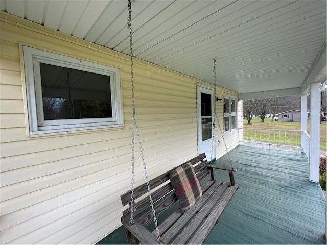 wooden deck featuring a porch