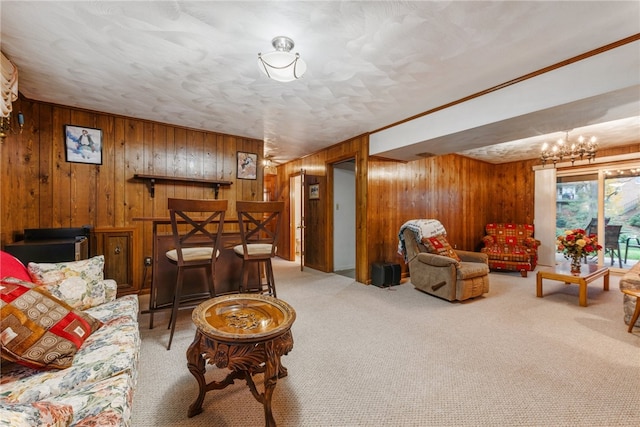 living room featuring wood walls, light colored carpet, and a chandelier