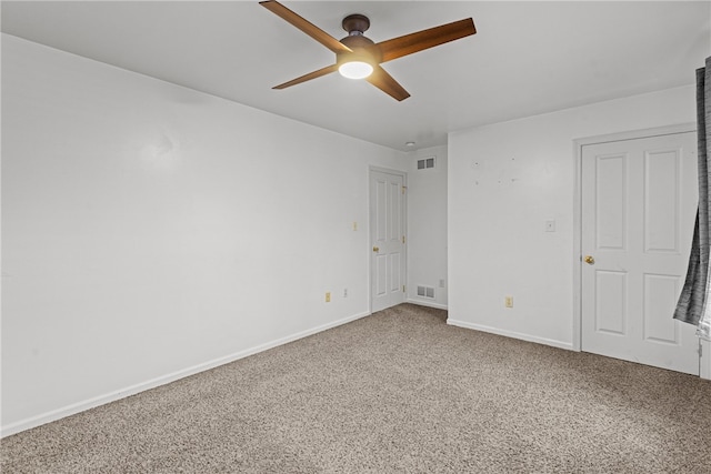 carpeted empty room featuring ceiling fan