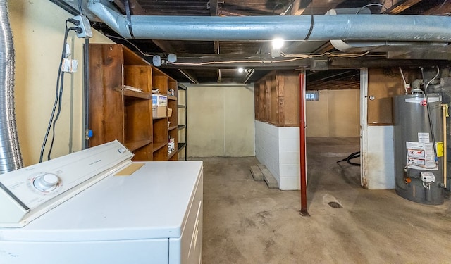 basement featuring washer / dryer and water heater