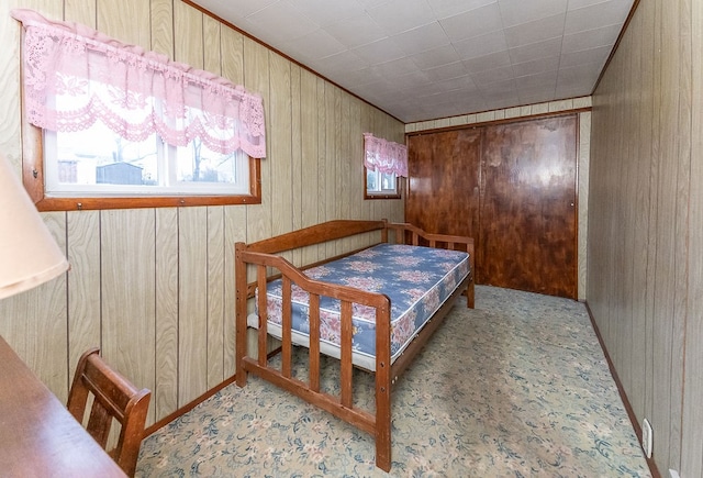 bedroom with wooden walls