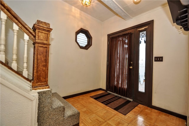 foyer entrance featuring light parquet flooring