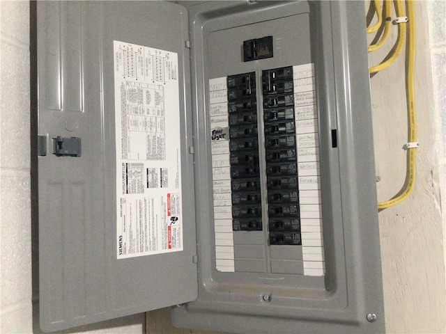 utility room featuring electric panel