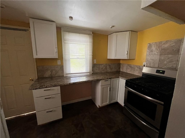 431 Euclid Ave, Glassport, PA 15045 - kitchen with stainless steel range with gas stovetop, white cabinetry, and built in desk