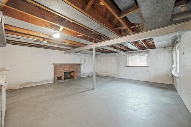 basement with a fireplace