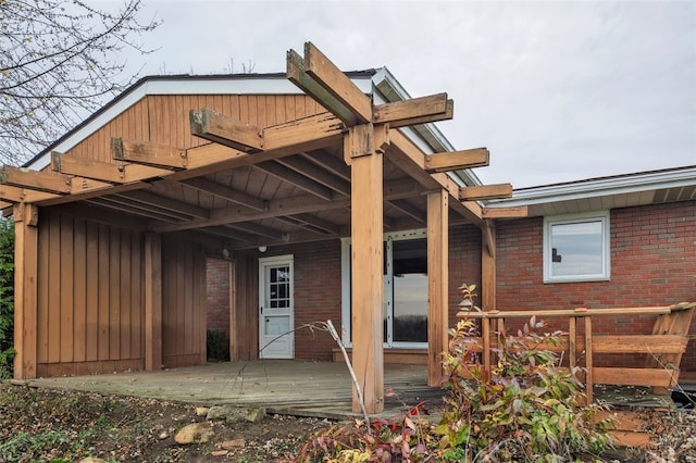 rear view of property with a deck