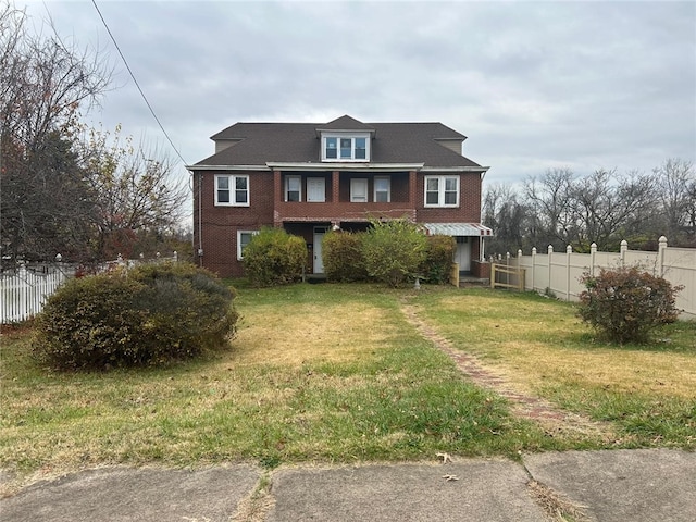 view of front of property with a front lawn