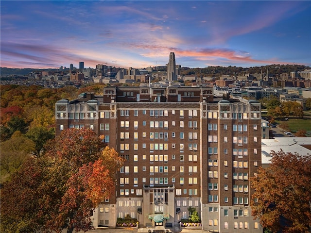 view of outdoor building at dusk