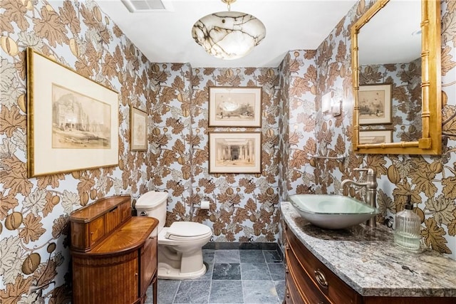 5023 Frew Unit 6Bc, Squirrel Hill, PA 15213 - half bathroom with wallpapered walls, toilet, baseboards, and vanity