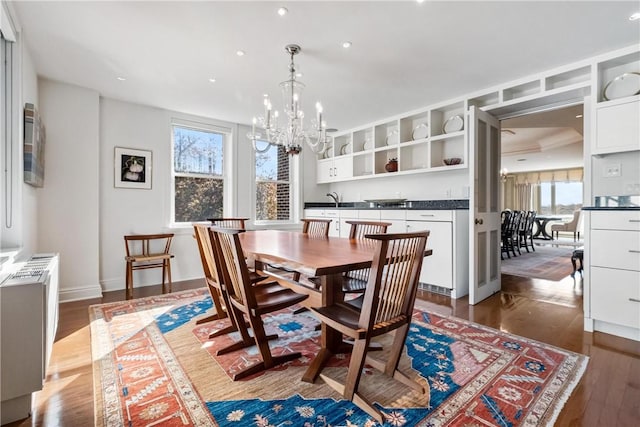 5023 Frew Unit 6Bc, Squirrel Hill, PA 15213 - dining room with a chandelier, dark wood-style flooring, recessed lighting, and baseboards