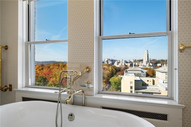 5023 Frew Unit 6Bc, Squirrel Hill, PA 15213 - bathroom view of wallpapered walls, a soaking tub, and a sink