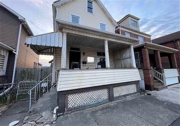 view of home's exterior with covered porch