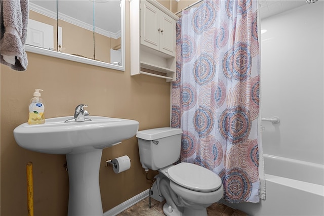 bathroom featuring shower / tub combo, toilet, and ornamental molding