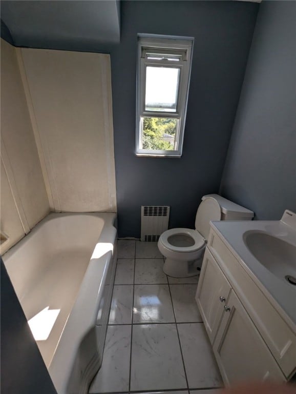 2225 Swallow Hill Rd, Scott Twp Sal, PA 15220 - bathroom featuring radiator, toilet, a tub, marble look tile flooring, and vanity