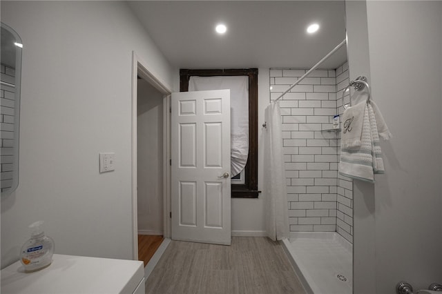 bathroom featuring a shower with curtain and wood-type flooring