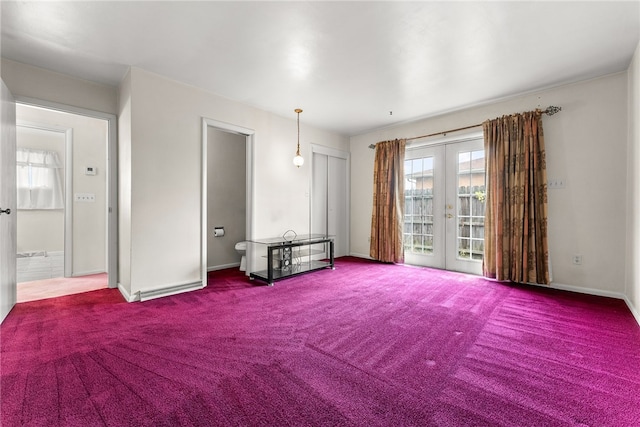 627 Wayne Ave, Monaca, PA 15061 - spare room with french doors, carpet flooring, and baseboards