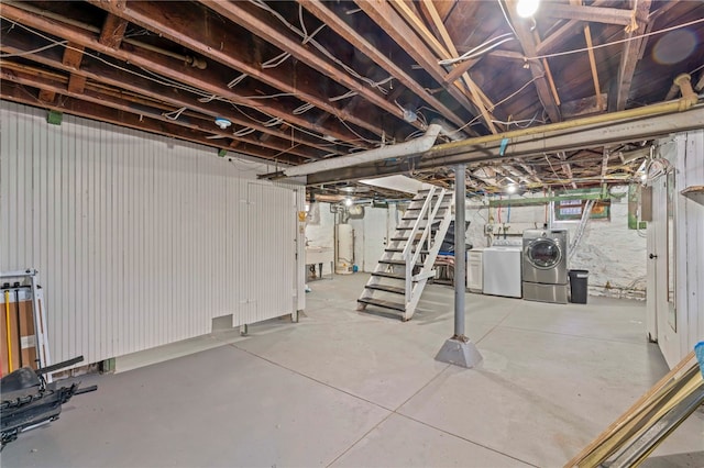 basement with separate washer and dryer