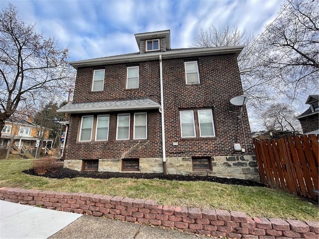 exterior space featuring a front lawn