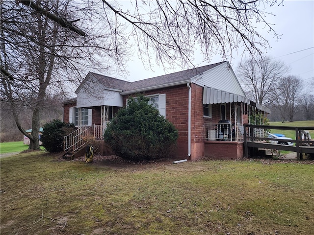 view of home's exterior featuring a yard